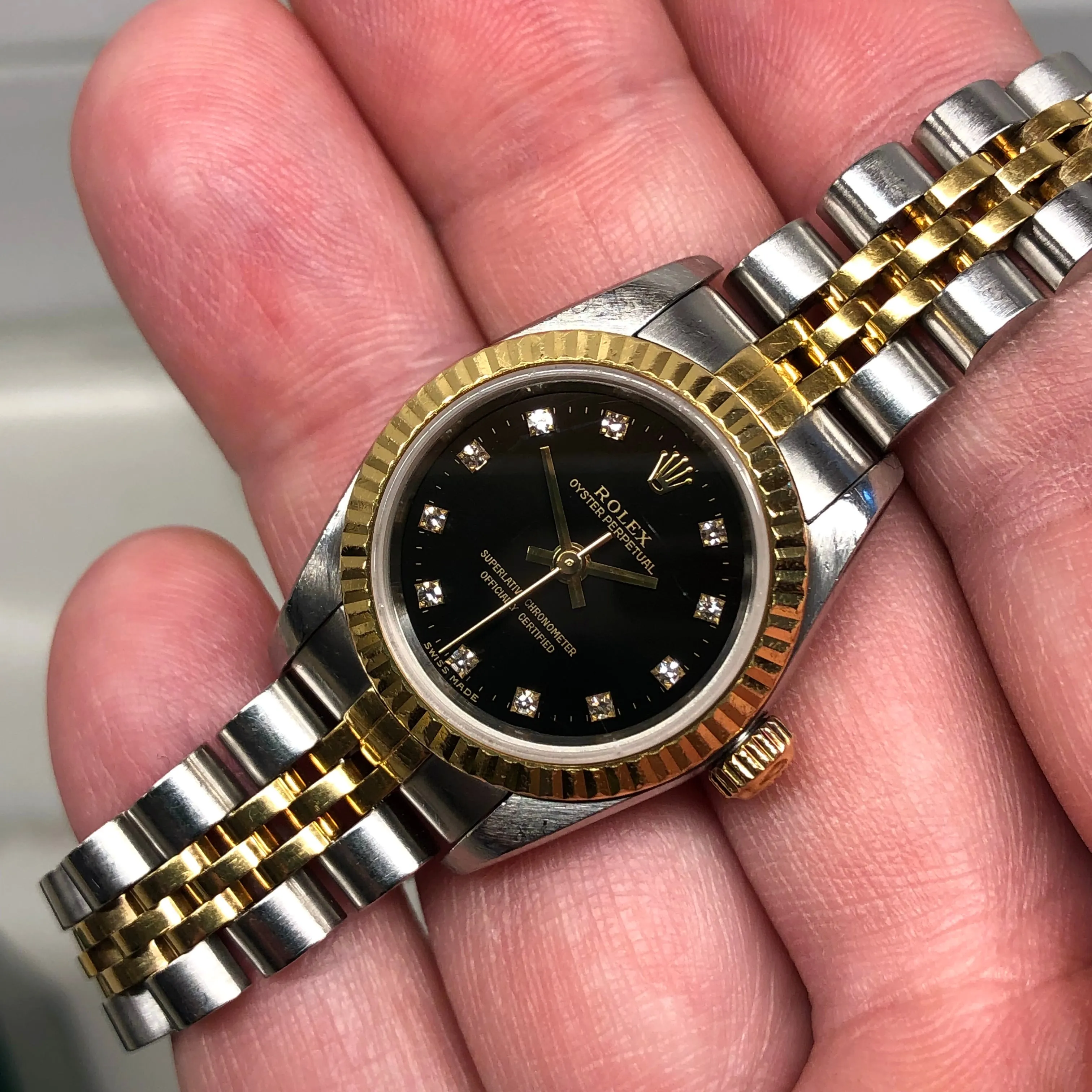 2002 Rolex Oyster Perpetual 76193 Ladies Two Tone Black Diamond Dial Jubilee No Holes Case Automatic Wristwatch