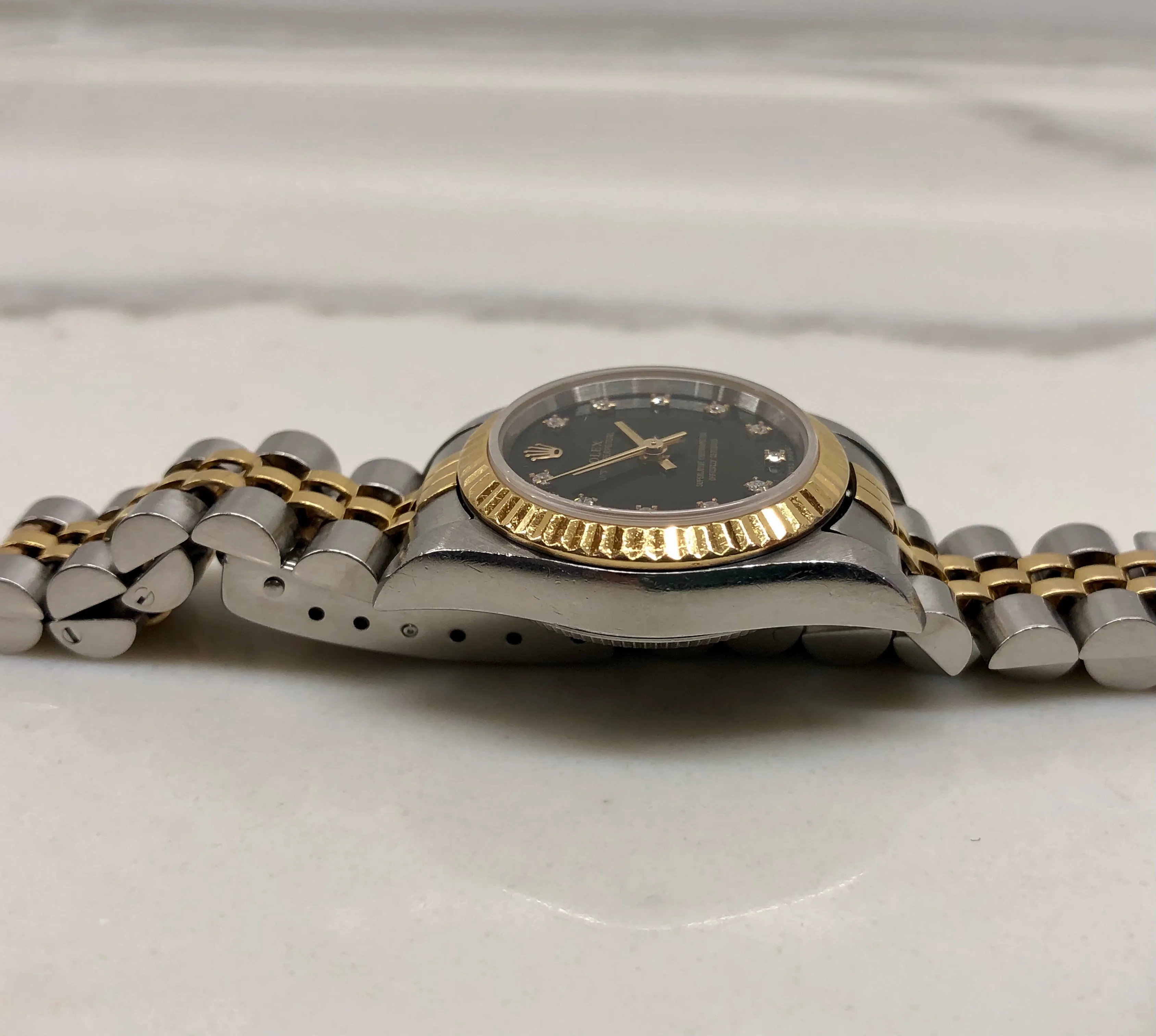 2002 Rolex Oyster Perpetual 76193 Ladies Two Tone Black Diamond Dial Jubilee No Holes Case Automatic Wristwatch