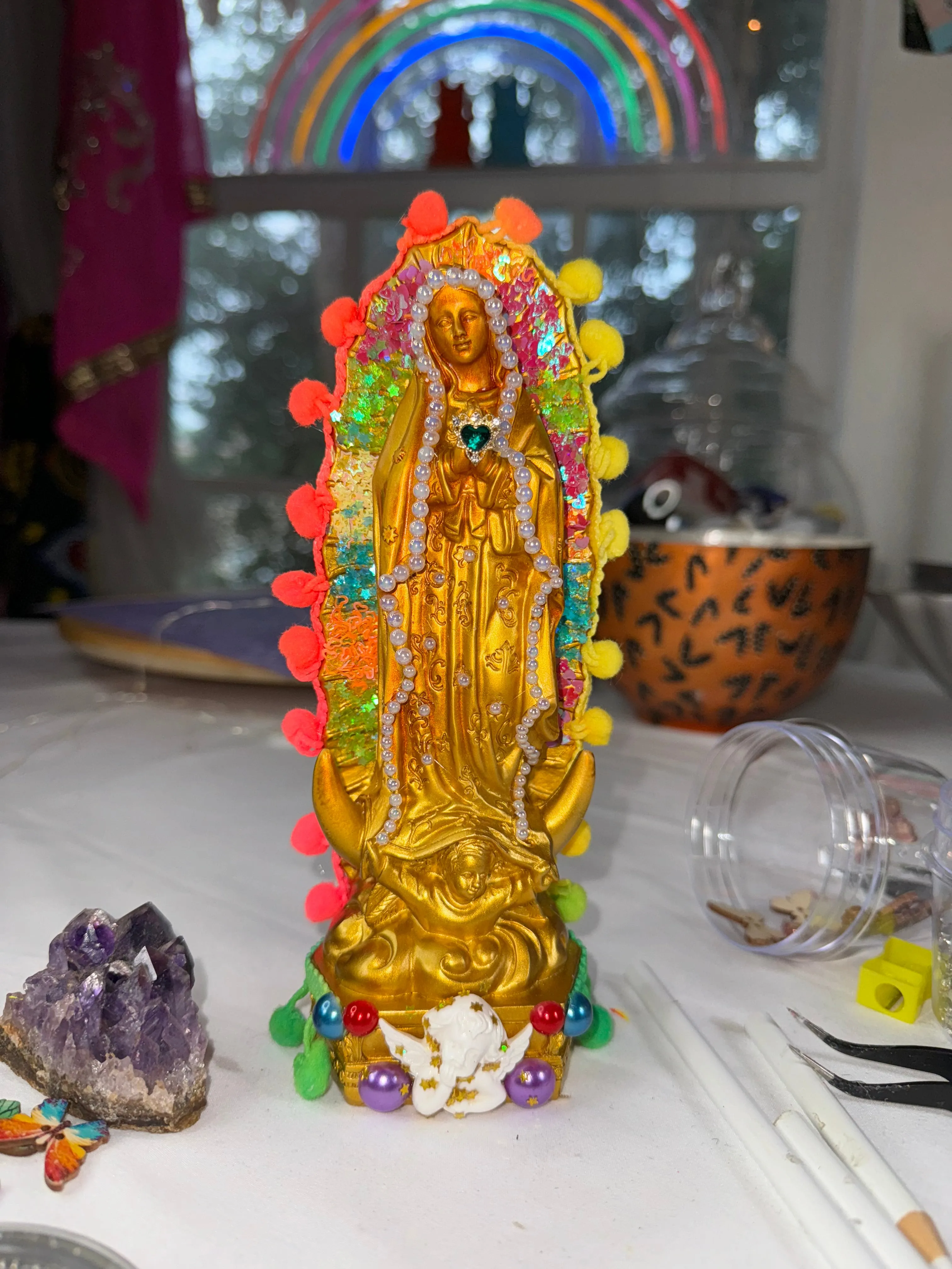 Golden Virgen de Guadalupe statue