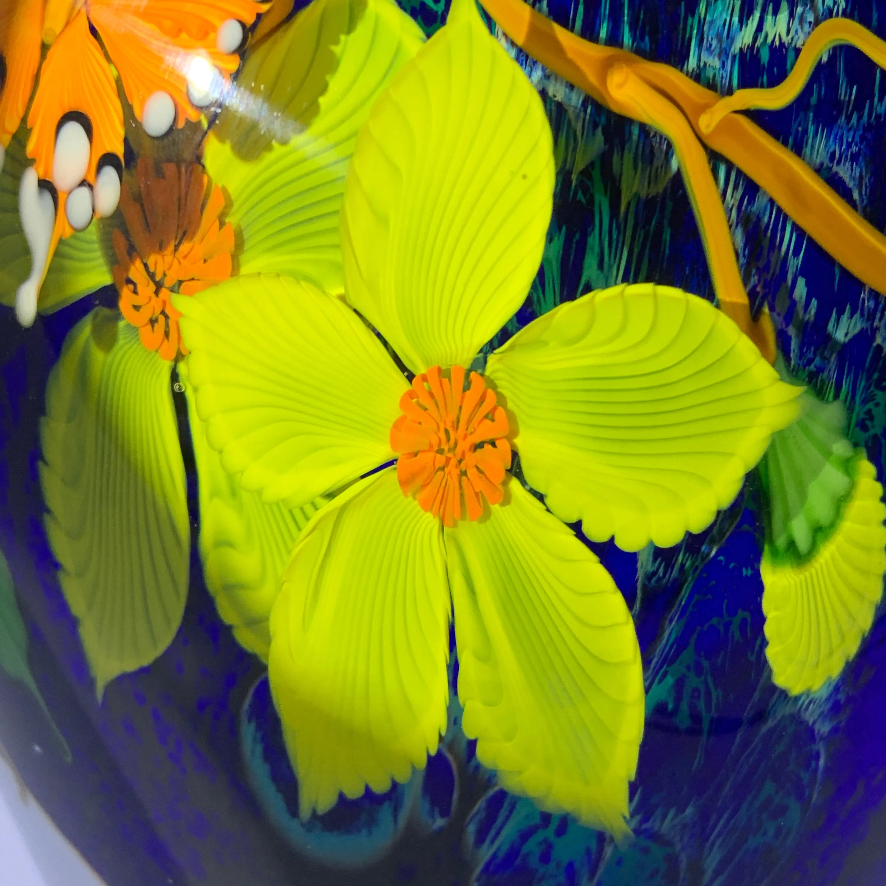 Mayauel Ward 2019 Compound Torchwork Orange Swallowtail Butterfly with Yellow Blossoms on Blue