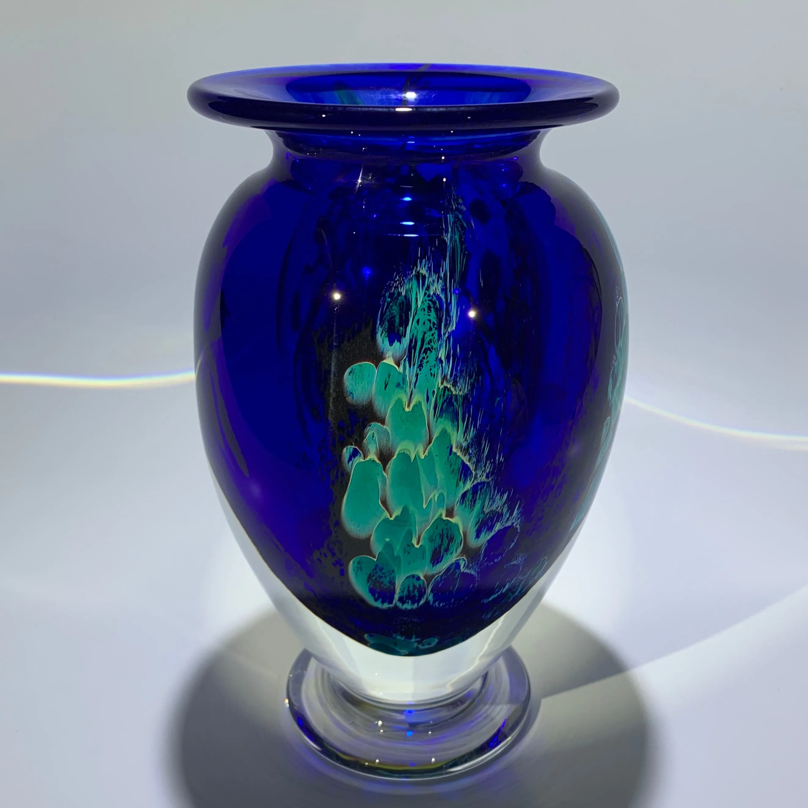 Mayauel Ward 2019 Compound Torchwork Orange Swallowtail Butterfly with Yellow Blossoms on Blue