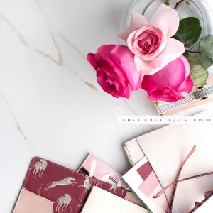 Pink Roses & Notebook on Marble Background. Stock Photo