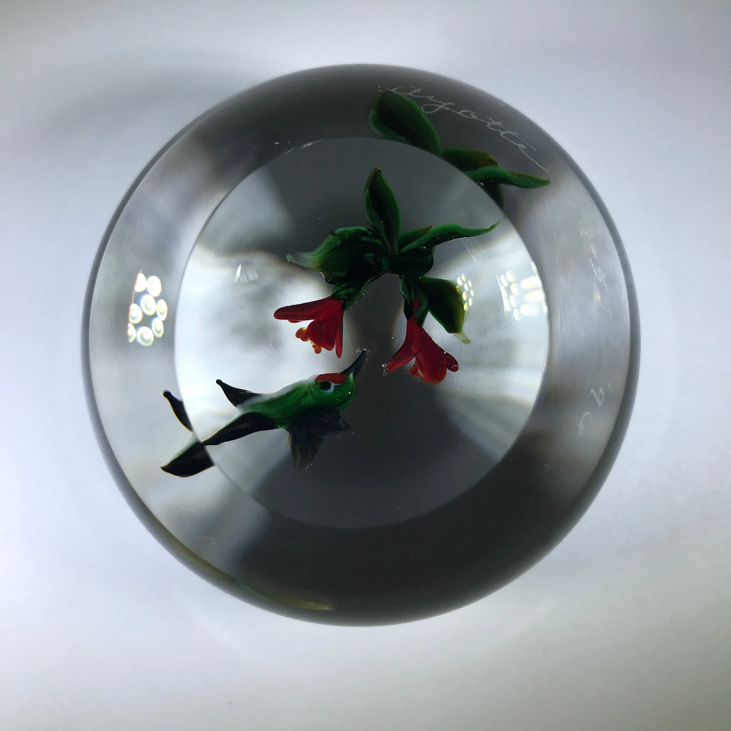 Signed Rick Ayotte Art Glass Paperweight Lampwork Hummingbird Feeding at Red Blossoms