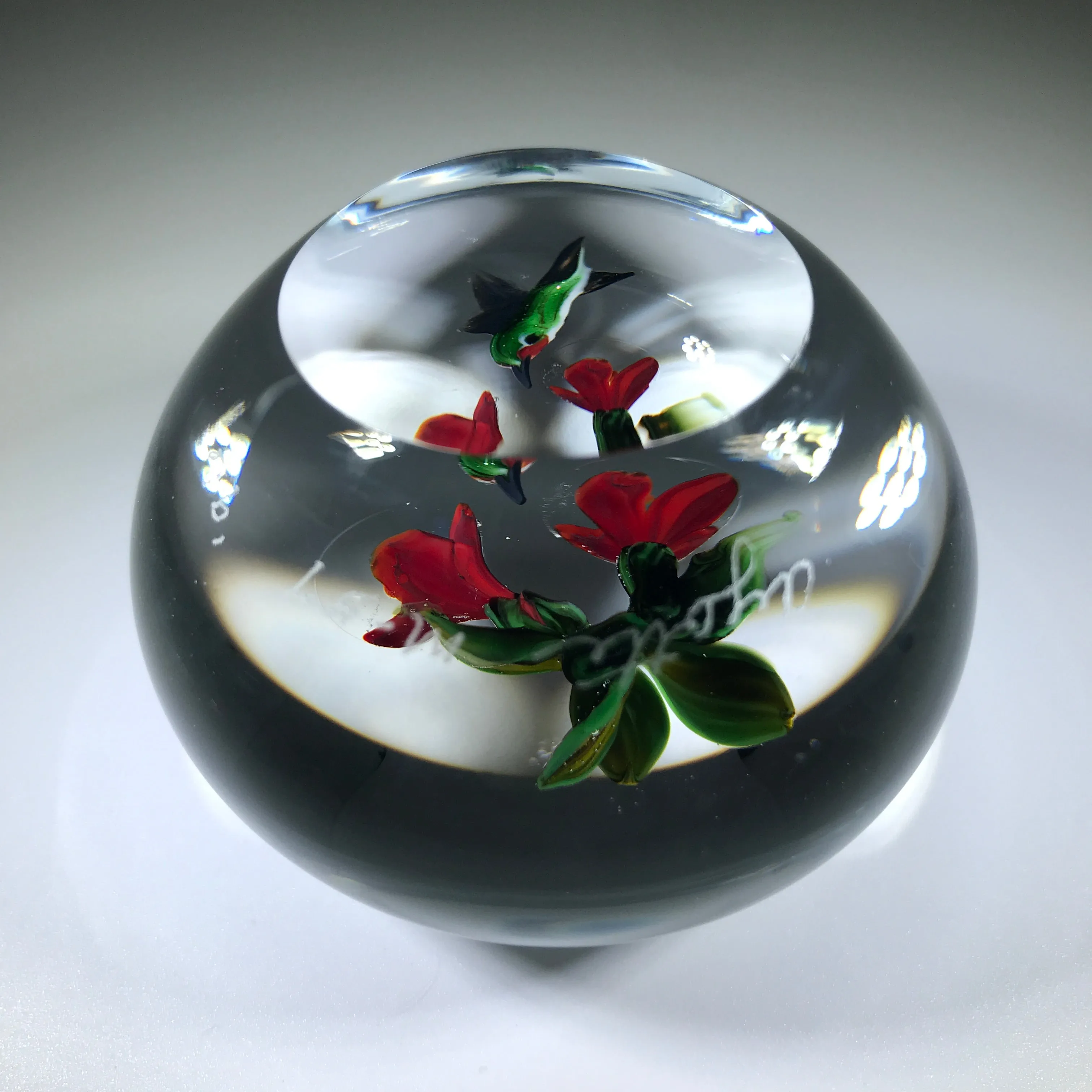 Signed Rick Ayotte Art Glass Paperweight Lampwork Hummingbird Feeding at Red Blossoms