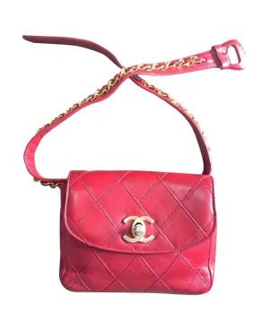 Vintage CHANEL red leather 2.55 waist purse, fanny pack, hip bag with gold CC closure and chain belt.  Belt 28”- 33”(71cm~77cm).