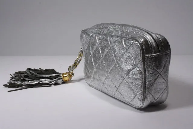 Vintage CHANEL Silver Lambskin Clutch