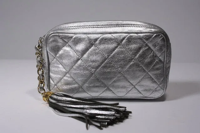 Vintage CHANEL Silver Lambskin Clutch