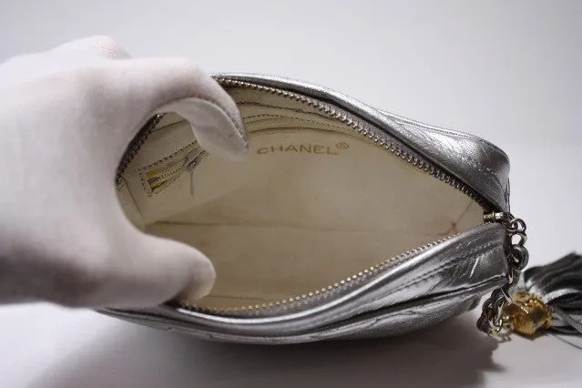 Vintage CHANEL Silver Lambskin Clutch