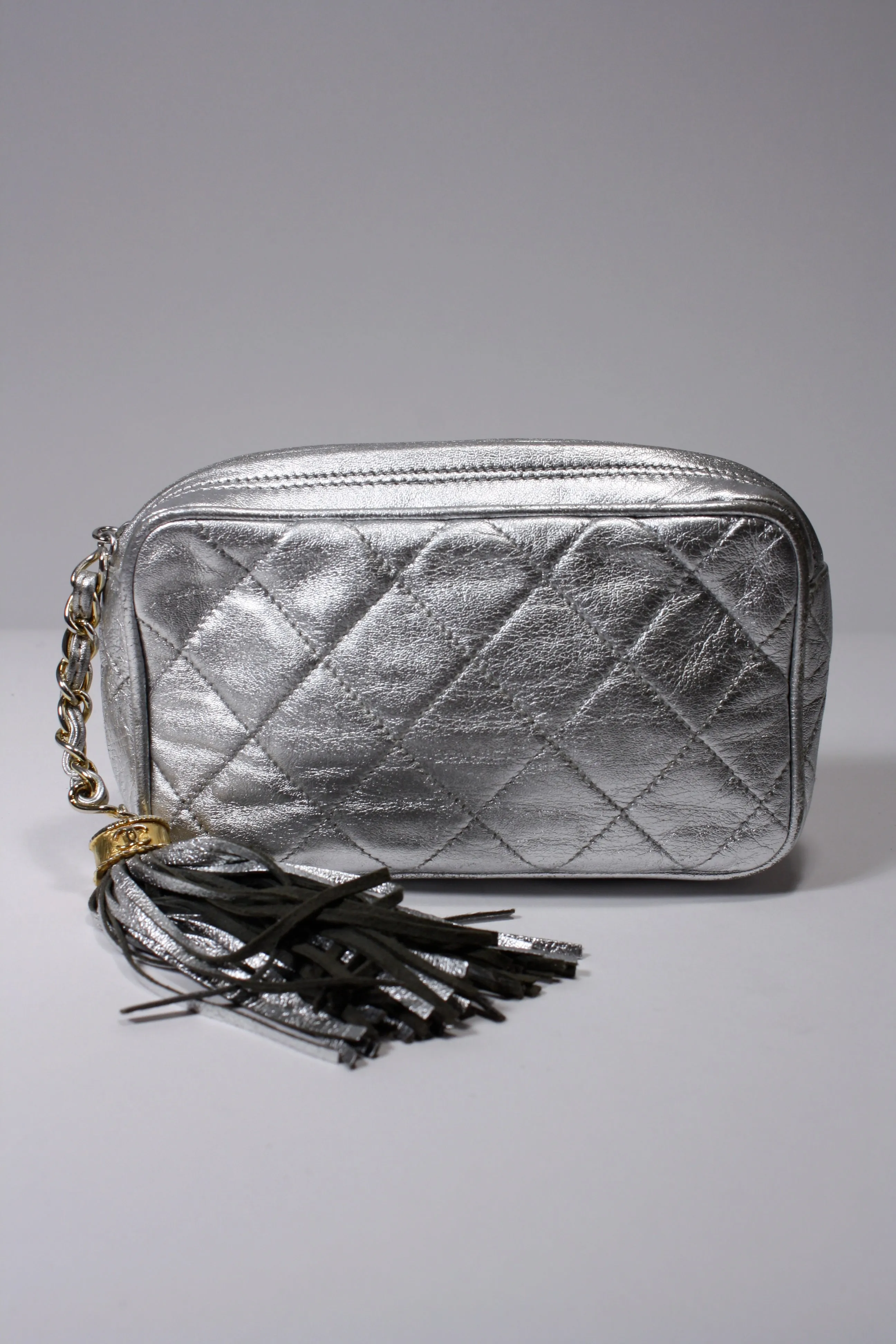 Vintage CHANEL Silver Lambskin Clutch